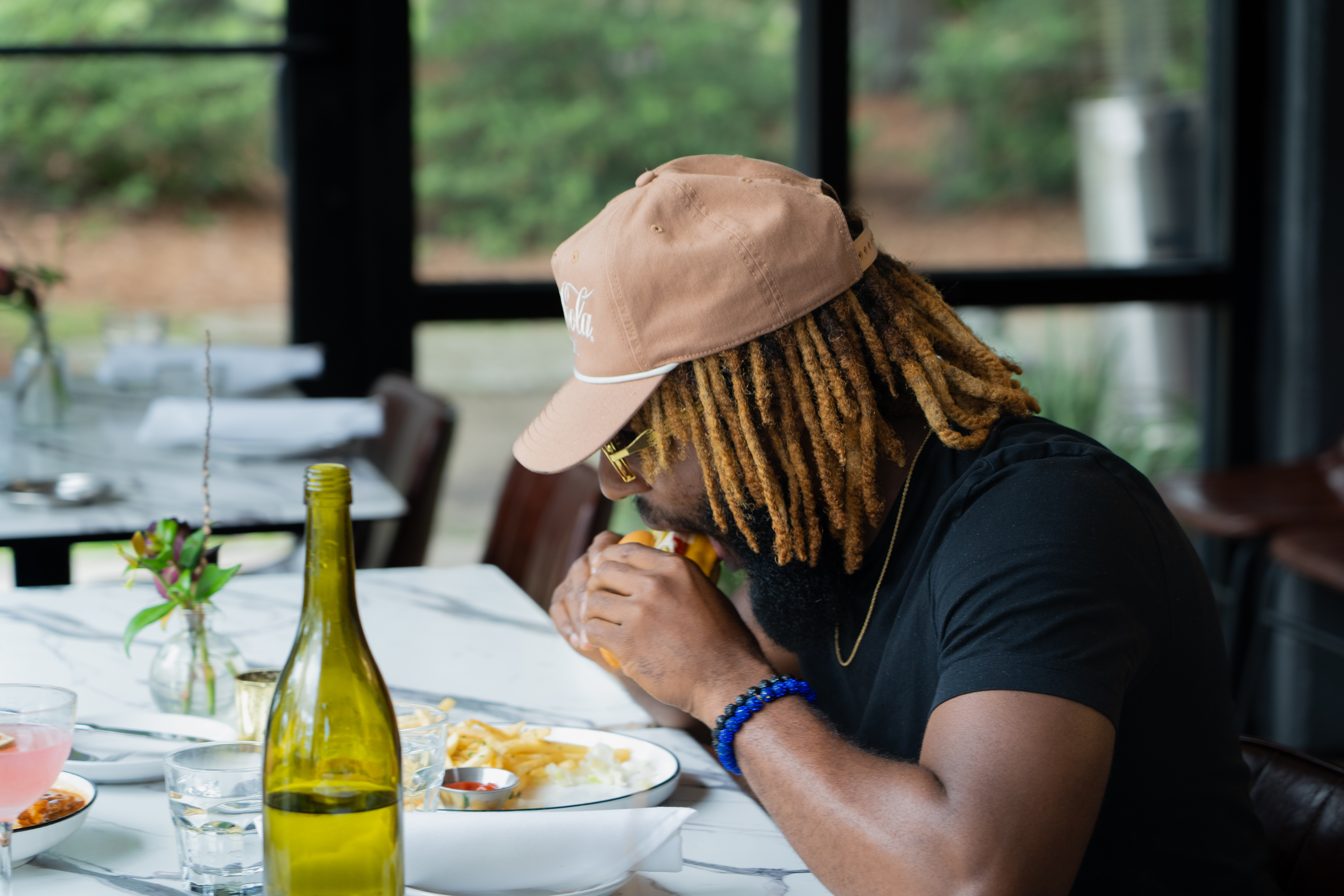Customer Enjoying A Meal At Momo Riverfront Park